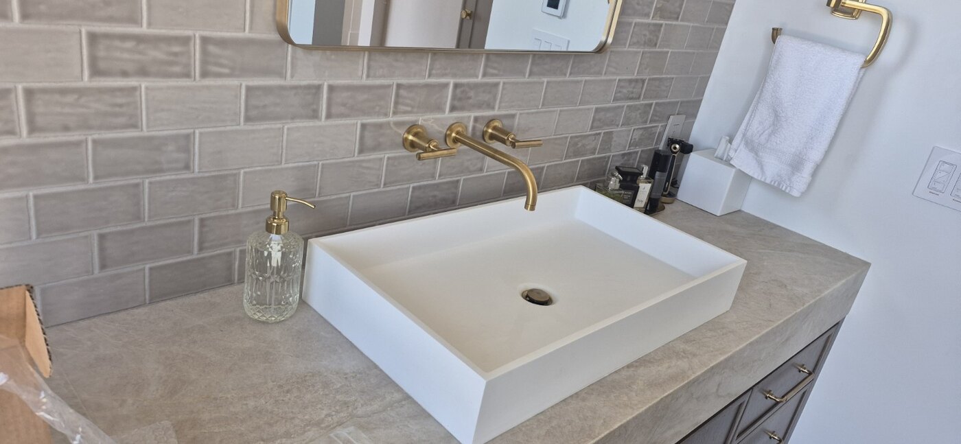 Finished bathroom vanity plumbing installation