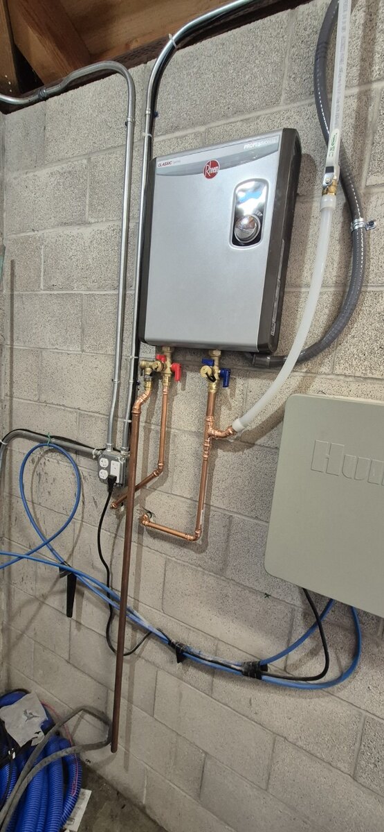 Completed water heater piping installation